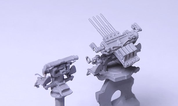 1.1" / 75 cal quad aa guns with Mk 44 director